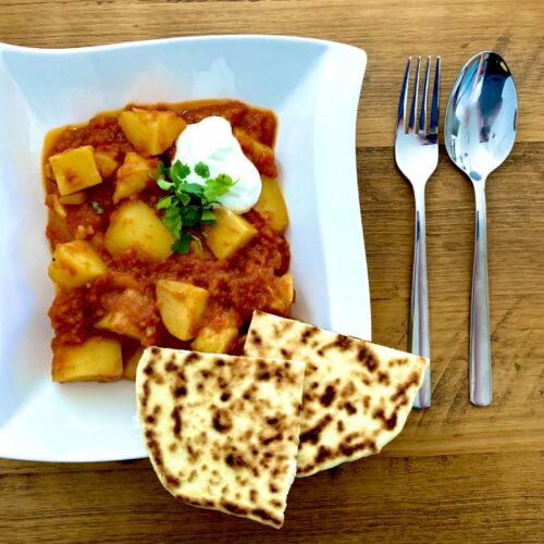 Curry mit Kartoffeln und Tomaten